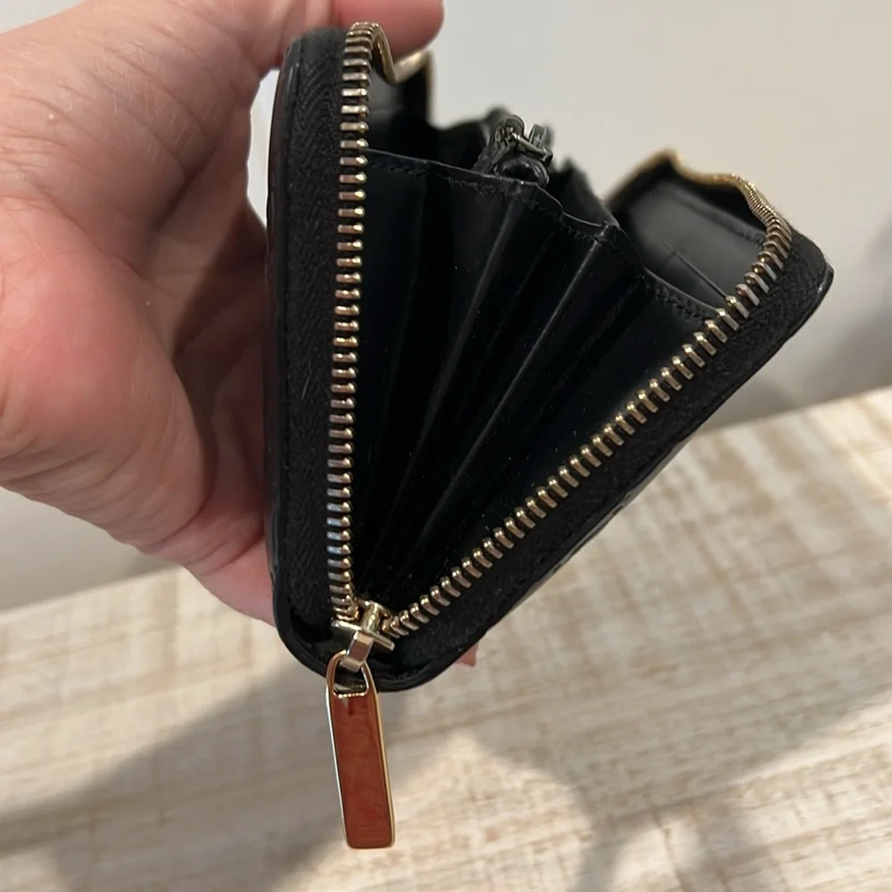 Gucci Black Embossed GG Leather Zip Wallet with Gold Tone Accent